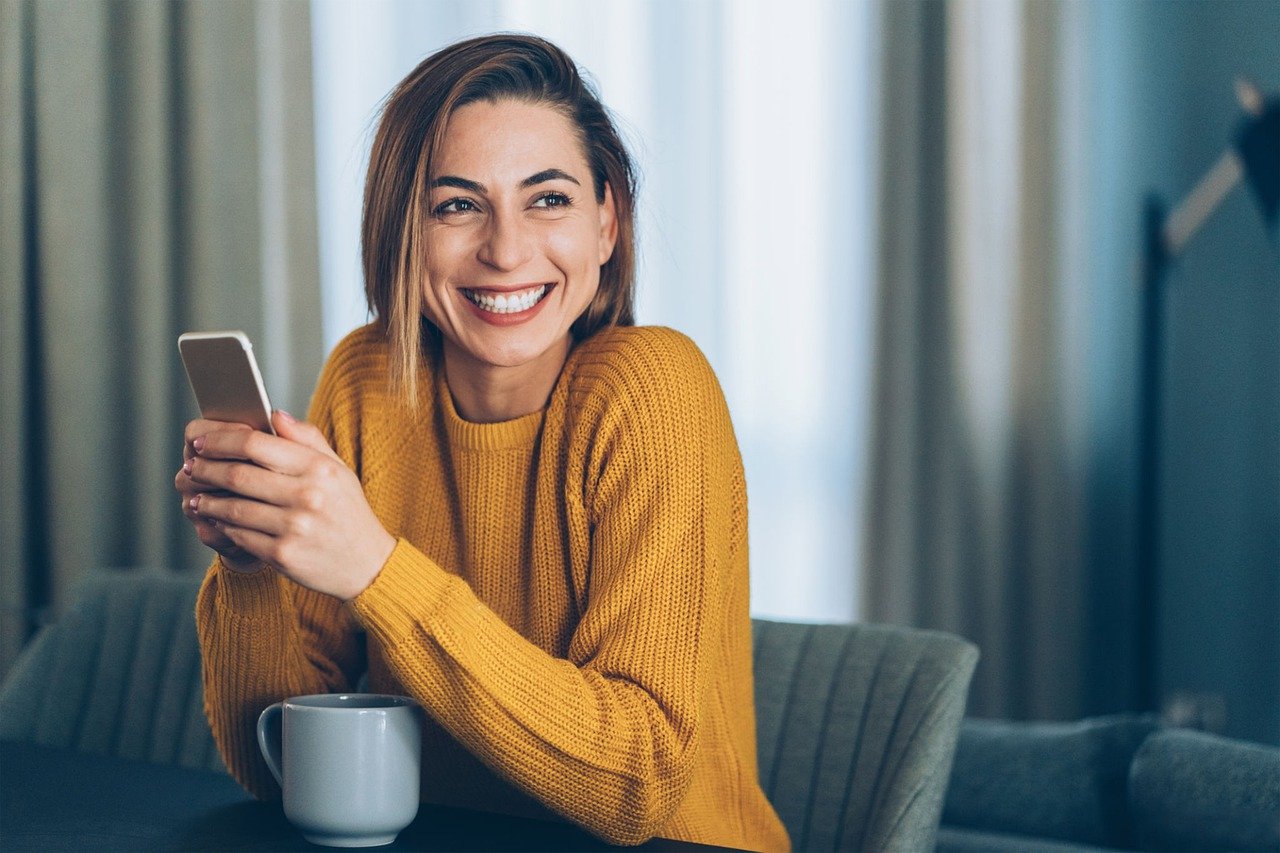 Woman smiling at bitcoin halving