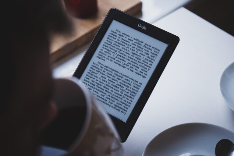 How do you force kindle to check for new books?