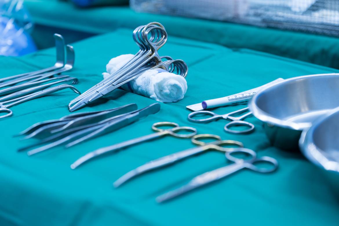 A tray of medical procedure instruments featuring a wide range of metals commonly used in everyday medicine.