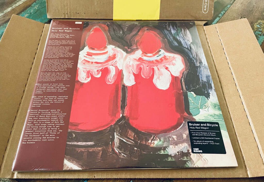 Geek insider, geekinsider, geekinsider. Com,, vinyl me, please unboxed: bruiser and bicycle 'holy red wagon', entertainment, living, reviews