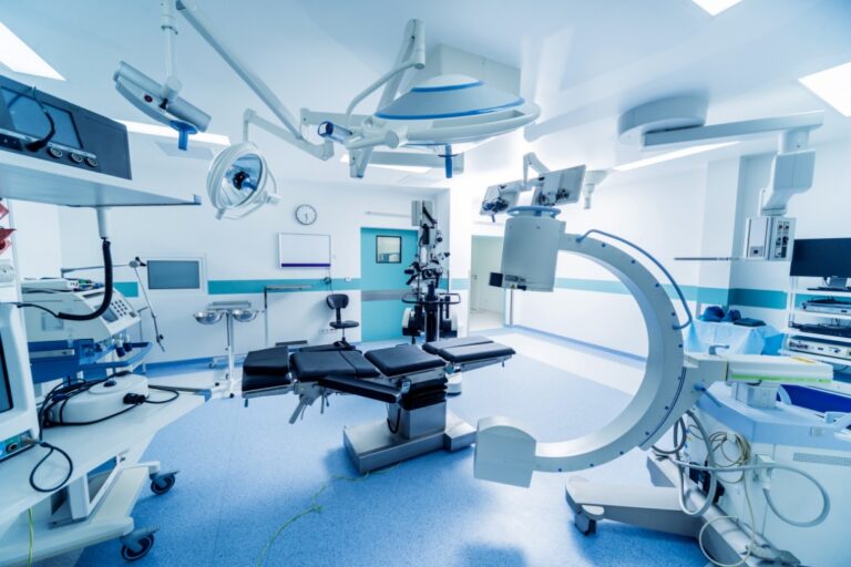 Modern neurosurgery equipment and medical devices arranged inside a clean, high-tech hospital operating room.