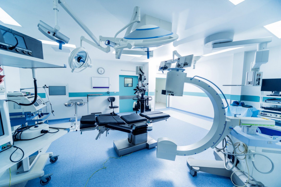 Modern neurosurgery equipment and medical devices arranged inside a clean, high-tech hospital operating room.